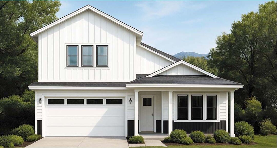A modern white two-story house with a garage and large windows in a lush green setting.